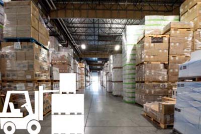 Express Wine Delivery's storage facility, rows of racks and boxes stacked and waiting for shipment.